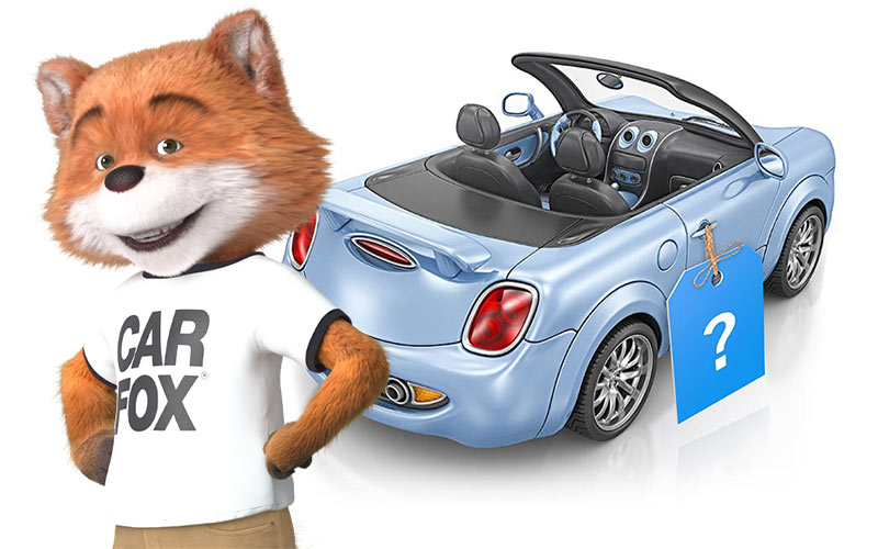 Car Fox beside car with price tag