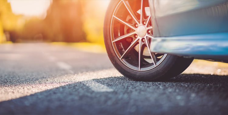 Closeup of car on a road